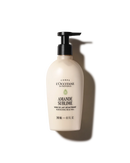 a bottle of L'OCCITANE en Province Amande Sublime, a nourishing hair care product.
