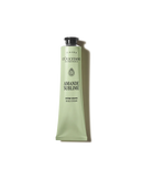 a tube of hand cream with a green color and a black cap.