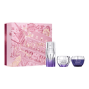 a set of beauty products from the Lancome brand, including a bottle, a jar, and a tube, all arranged in front of a pink box with a decorative illustration.