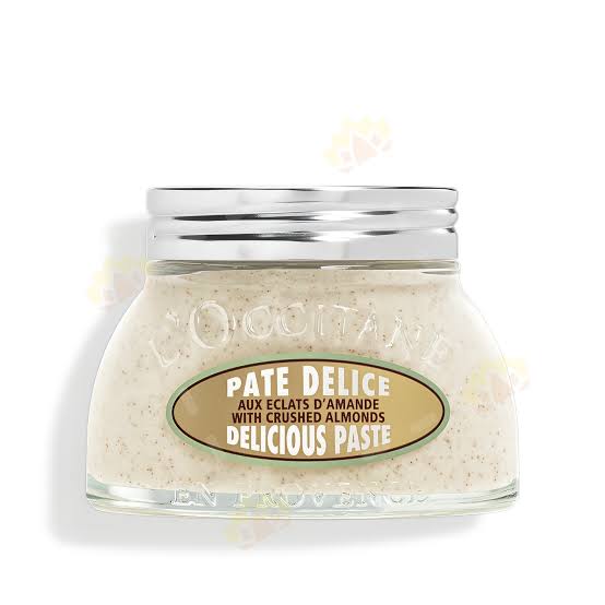 A jar of L'Olivee Paté Delice, a creamy almond paste, with a silver lid and a label that reads "Pate Delice, Aux Eclats d'Amandes, with Crushed Almonds, Delicious paste".