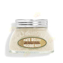 A jar of L'Olivee Paté Delice, a creamy almond paste, with a silver lid and a label that reads "Pate Delice, Aux Eclats d'Amandes, with Crushed Almonds, Delicious paste".