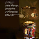 A decorative Christmas ornament with a spinning carousel and a festive candle accessory, placed on a table.
