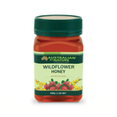 a jar of Australian Wildflower Honey with a green lid.