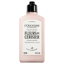 A bottle of L'Occitane France floral body lotion.