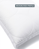 A pillow with a medium/high profile design, featuring a white circular pattern.