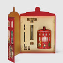 a red box with a lid and a red jar with a lid, both of which are decorated with illustrations of people and buildings.