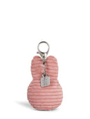 A pink, coiled keychain with a silver metal clasp and a small tag attached to it.