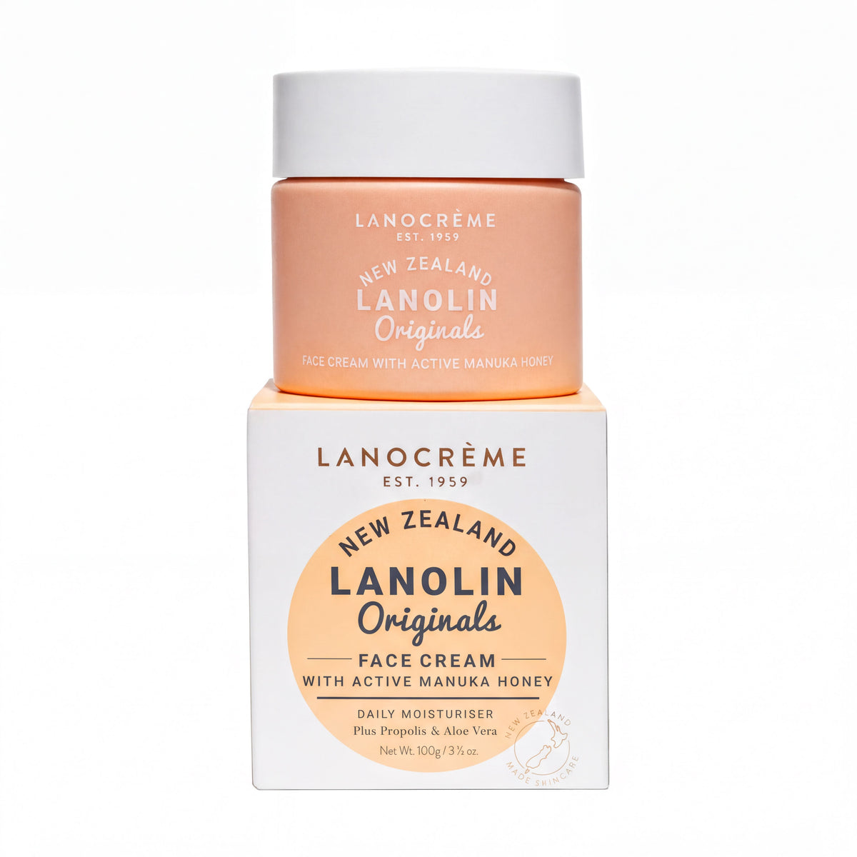 a container of Lanocreme New Zealand Lanolin Origins face cream with active Manuka honey, along with its packaging.