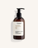 A brown bottle of L'Occitane Force & Volume Volume & Strength shampoo and conditioner.