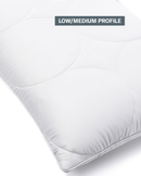 A pillow with a low/medium profile design, featuring a white, quilted pattern.