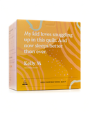 The image is a box for a children's wool quilt, featuring a vibrant yellow and orange color scheme with a text description and a small logo.