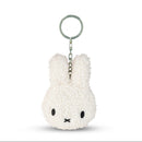 A white plush rabbit keychain with a black eye and nose design.