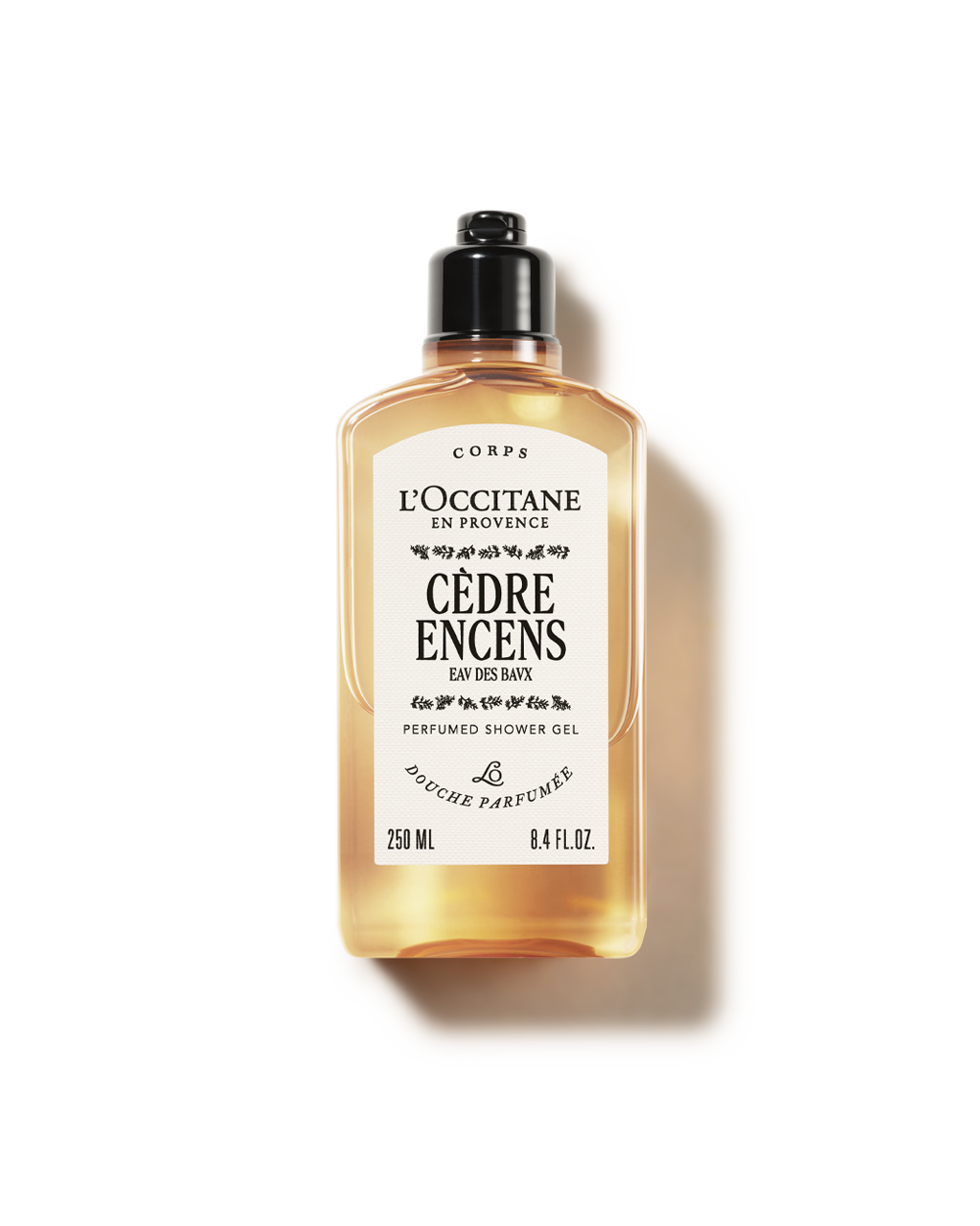 A bottle of L'Occitane Eau De Bax shower gel from France.