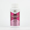A bottle of cranberry supplement with a white cap and a pink label.