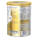 The image is a can of baby formula with a yellow and blue color scheme.