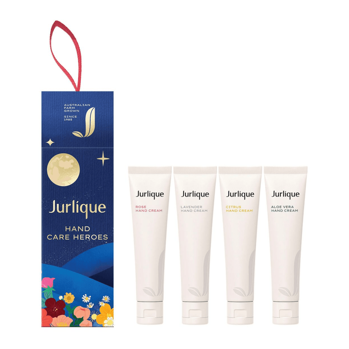 A set of four Jurlique hand care products, including a hand cream, hand lotion, hand cream, and hand cream, presented in a blue and gold packaging with a red ribbon.