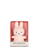A pink plush bunny toy is displayed in a pink box with the text "BON TON TOYS EST. 1933".