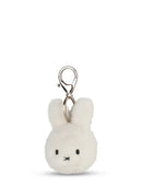 A white plush rabbit charm with a silver metal clasp attached to it.