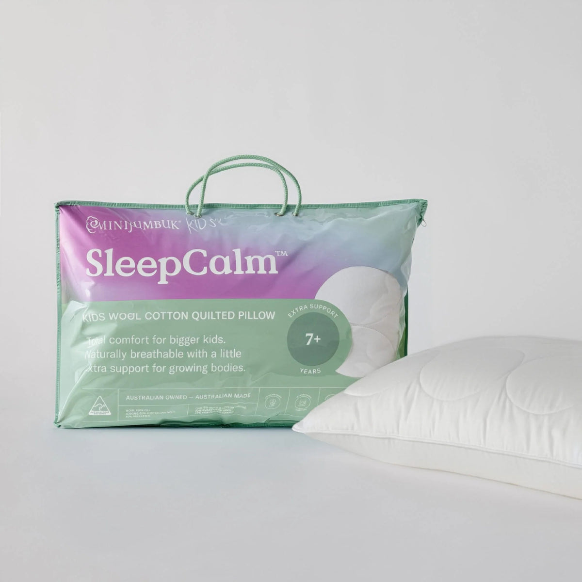 a pillow and a pillow on a white surface