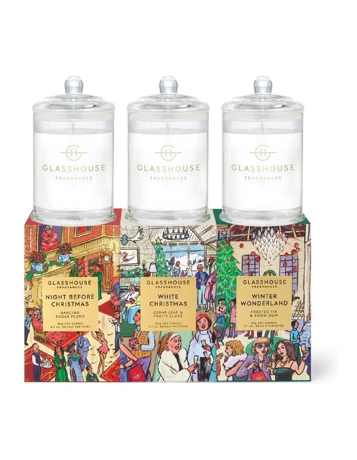 three glass jars with labels, each containing a different fragrance from the Glasshouse brand.