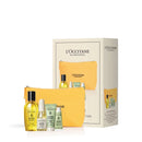 a set of L'Occitane skincare products, including a yellow cosmetic bag, a yellow cosmetic bottle, and a yellow cosmetic tube, all of which are part of the L'Occitane collection.
