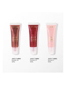 three tubes of lipstick with different shades, arranged in a row against a white background.