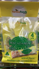 A package of Macadamia Nut Bar bars from Yamba Foods Australia, with a yellow and green color scheme.