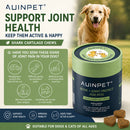The image is an advertisement for a product called "Auipet Shark Cartilage Chews" for dogs. It features a large dog standing next to a green container of the product, with a close-up of the product itself.