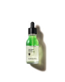A bottle of green liquid with a black cap, labeled as an anti-churning hair loss treatment from the brand L'OCCITANE.