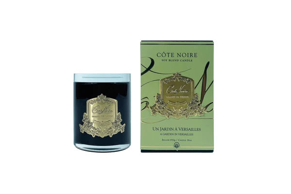 a black candle and its packaging.