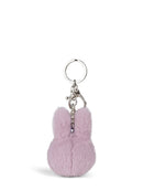 A keychain in the shape of a small, furry bunny.