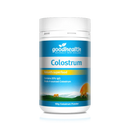 a bottle of colostrum powder, a natural food supplement, with a label that includes the Good Health logo and the product name.