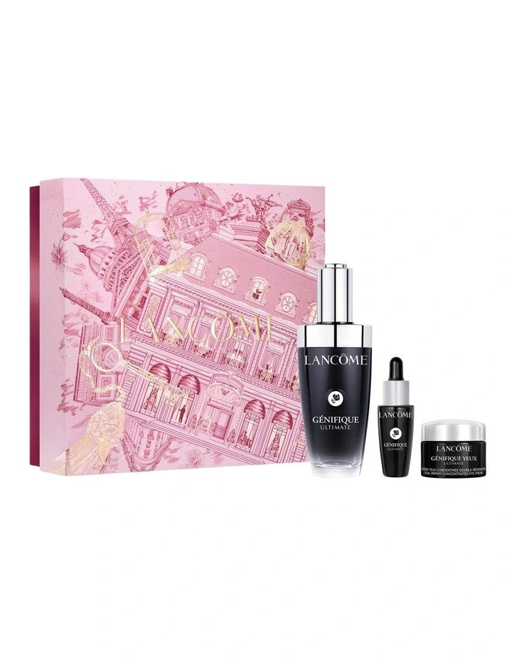 a set of beauty products, including a bottle, a tube, and a jar, all of which are from the Lancome brand.