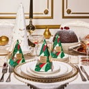 a beautifully set table with a variety of dishes, including a cake, a bowl of fruit, and other holiday-themed items. The table is adorned with gold and white decorations, and the overall scene conveys a festive and elegant atmosphere.