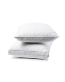 two white pillows stacked on top of each other against a white background.