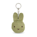 A green plush rabbit keychain with a silver metal ring attached to it.