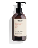 A bottle of L'Occitane Repair Intense Hair & Scalp Repair shampoo, containing 500 mL (16.9 FL OZ) of the product.