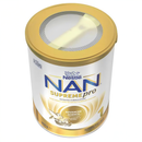 A can of Nestle Nan Supremed Pro, a powdered infant formula, with a gold lid and a label that includes the product name and nutritional information.