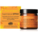 two bottles of Antipodes skincare products, a jar and a box. The jar is brown and has a black lid, while the box is orange and has a yellow border. The products are labeled as "Supernatural SPF50+" and "Ceramide Silk Facial Sunscreen".