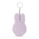 A keychain in the shape of a bunny with a fluffy, textured appearance.
