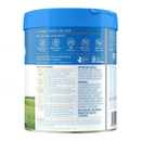 The image is a can of organic baby milk with a blue lid.