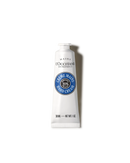 A tube of hand cream against a black background.