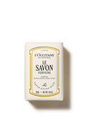 a rectangular bar of soap with a label that provides information about the product.