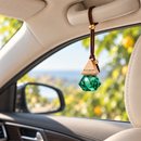 Blue Jacar Home MINI Diffuser 8ml Citrus Herb safely displayed in a car interior