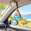 Blue Jacar Home MINI Diffuser 8ml Coastal Flora safely displayed in a car interior
