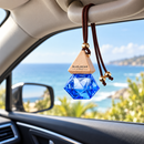 Blue Jacar Home MINI Diffuser 8ml Venetian Sea Breeze safely hanging in a car interior