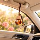 Blue Jacar Home MINI Diffuser 8ml Wild Rose safely displayed in a car interior