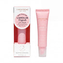 a pink lip balm tube and its packaging, both of which are from the New Zealand Lanolin brand.