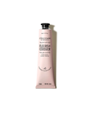 A tube of L'occtane hand cream with a pink color.