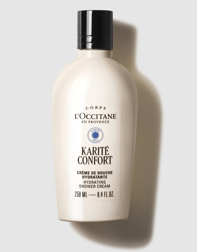 a bottle of L'Occitane Karite Comfort shower cream, a hydrating shower cream from the brand CORPS L'OCCITANE en PROVENCE.